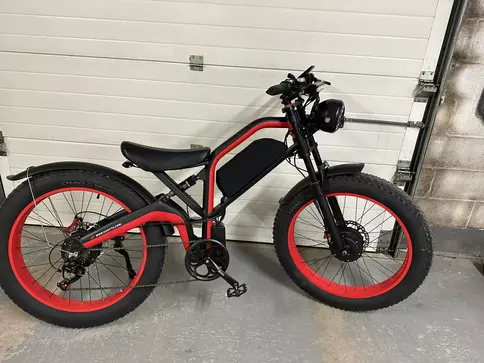 A red and black duotts N26 electric bike